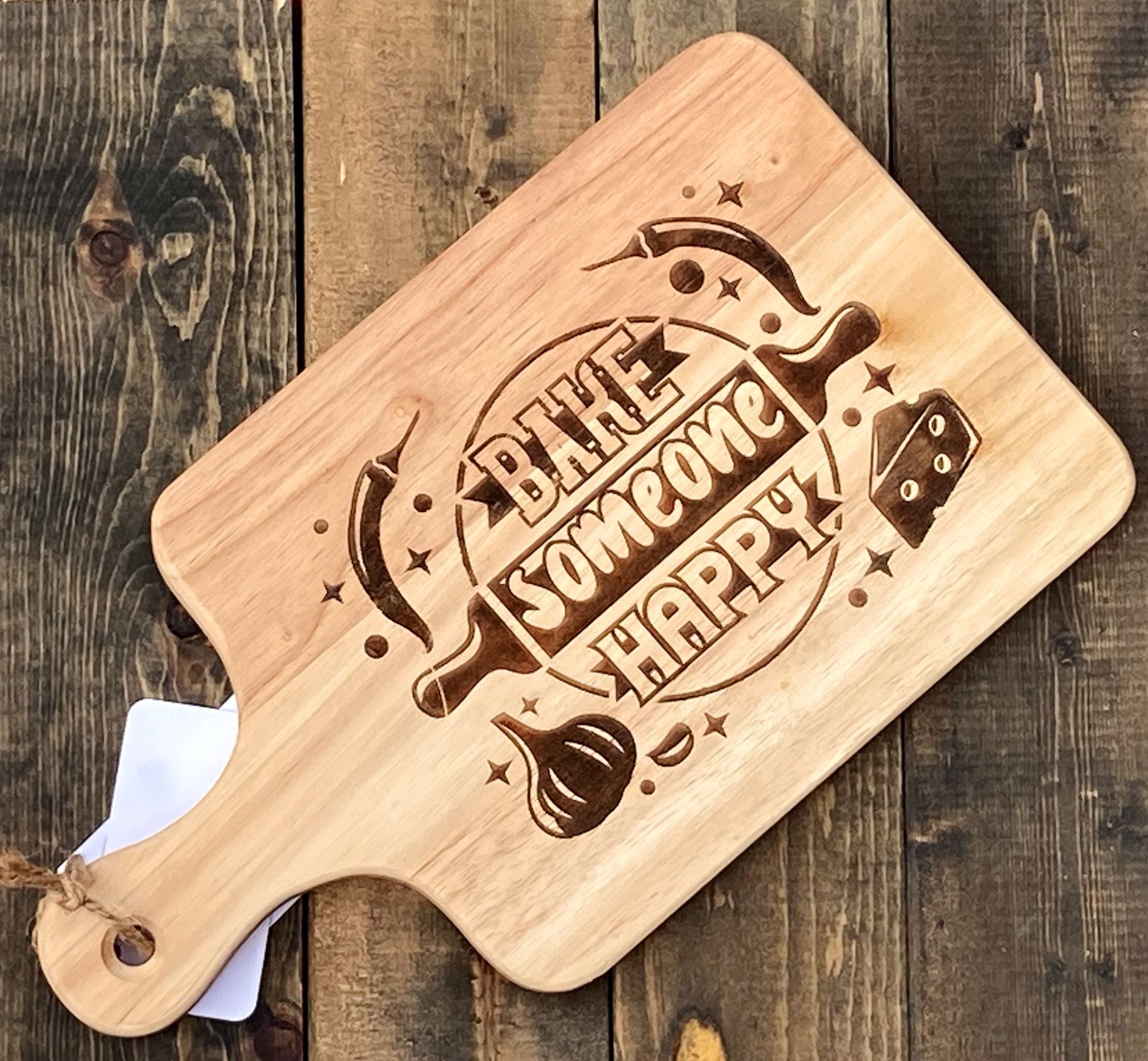 https://willowispapothecary.com/cdn/shop/files/BakeSomeoneHappyCuttingBoard_2216x.jpg?v=1696597091